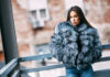 Gorgeous woman posing in luxurious fur coat