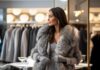 Woman in a winter clothing store. Winter sale, New Year’s discounts